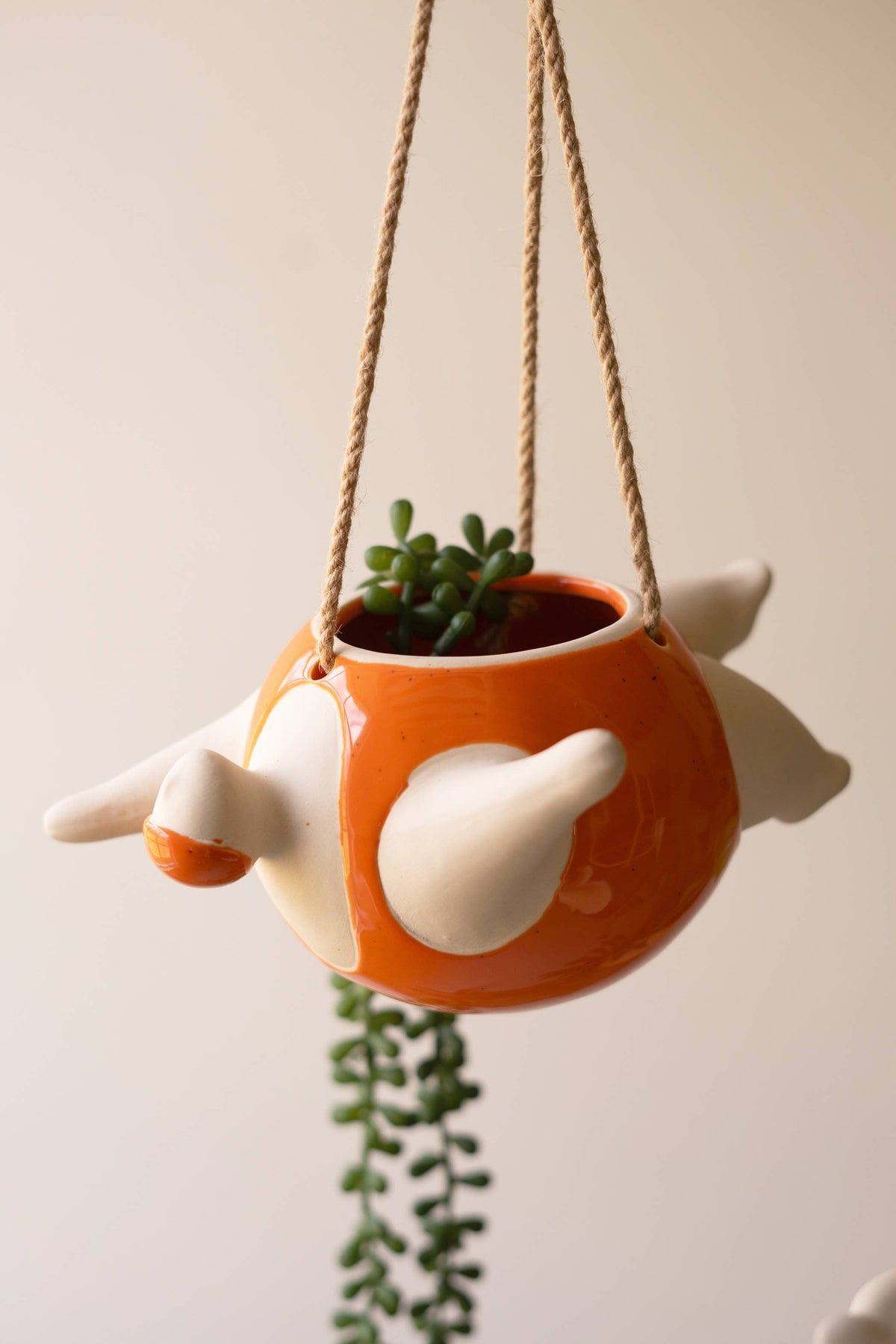 SET OF TWO HANGING CERAMIC SWIMMERS PLANTERS - ONE EACH